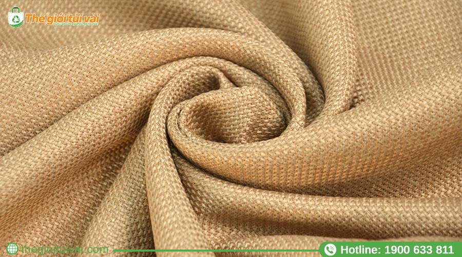 Bề mặt vải sợi đay với kết cấu sợi rõ ràng, màu sắc tự nhiên Bề mặt vải sợi đay với kết cấu sợi rõ ràng, màu sắc tự nhiên